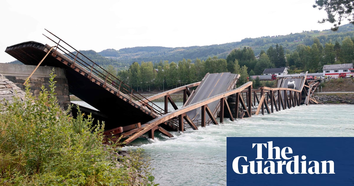 Norway bridge collapses with two drivers needing rescue – video