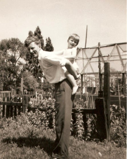 A black and white image of Billy Bragg as toddler on his father’s back. 