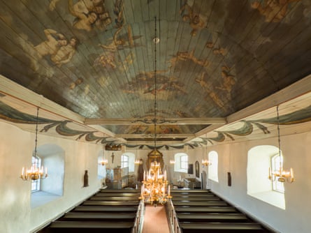 Interior of an old Scandinavian church with ceiling frescoes