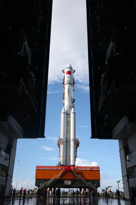 The Long March 7 carrier rocket moves vertically to the launch tower in Wengchang, 22 June 2016