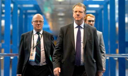 Secretary of state for Scotland Alister Jack (R) arrives for day four of the Conservative party conference on 5 October 2022 in Birmingham, England.
