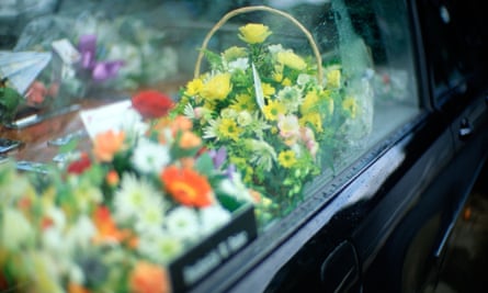 Detail of flowers in window of undertaker's hearse