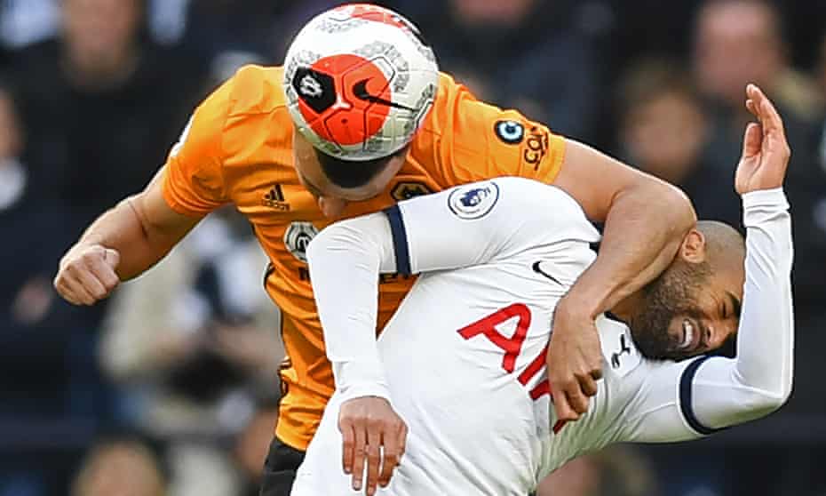 Wolves’ Romain Saiss (left) vies with Tottenham Hotspur’s Lucas Moura in the Premier League