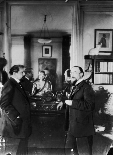Claude Debussy, left, with Satie c1900