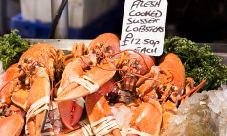 Fresh cooked Sussex lobsters are seen for sale in Borough Market in London