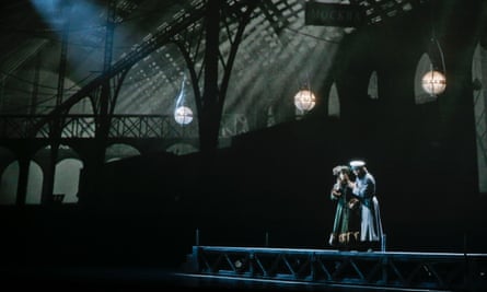 David Finn’s projected film and glorious lighting washes over the stage
