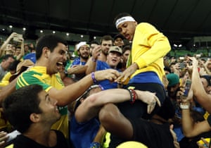 Neymar is carried along by the crowd