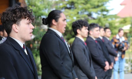 Students await the arrival of Prime Minister Jacinda Ardern to Tamaki Maori Village in Rotorua,