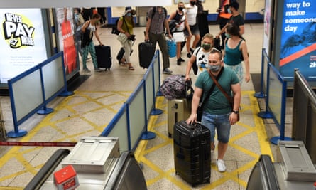 Passengers arrive at Heathrow from Spain.