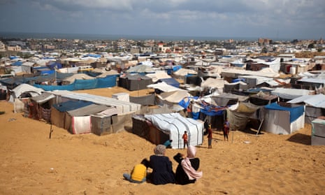Displaced Palestinians shelter in a tent camp in the al-Mawasi area in Khan Yunis in southern Gaza on 21 September.