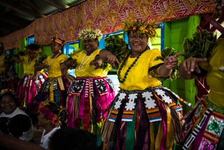 women dancing in traditional costumes