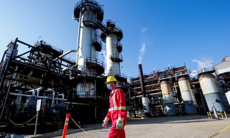 A Shell employee walks past the company's Quest carbon capture and storage facility in Fort Saskatchewan, Alberta, Canada