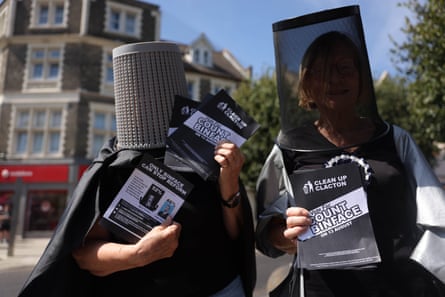 Count Binface supporters dressed in bins and capes.