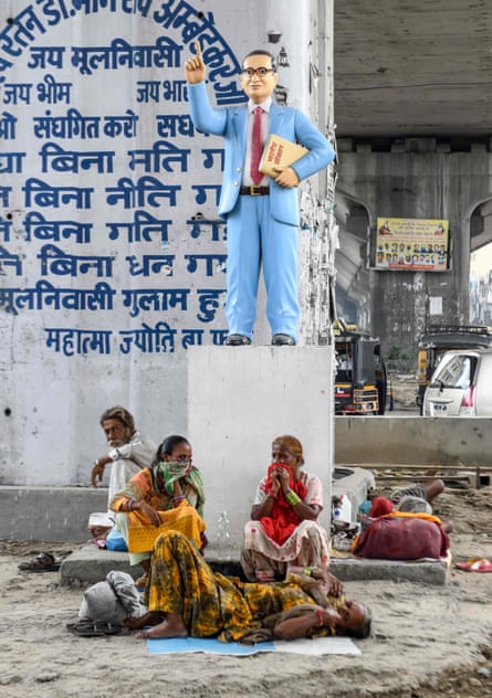 A statue of Bhimrao Ambedkar under a flyover in Amritsar, India.