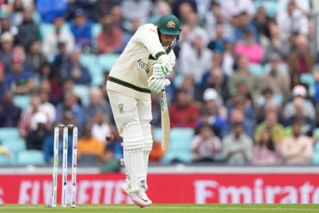 Usman Khawaja plays a shot off the bowling of Mohammed Siraj.