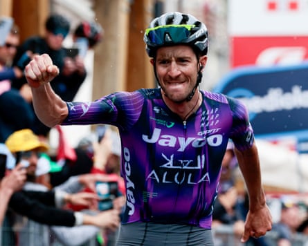 Team Jayco AlUla's rider Chris Harper celebrates his first grand tour stage win