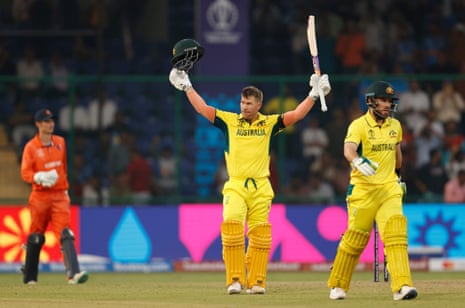 David Warner celebrates after reaching his century.