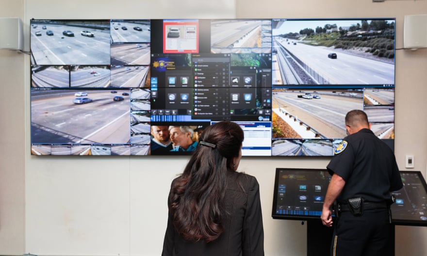 The Pittsburg police captain Patrick Wentz and the deputy district attorney for Contra Costa county Mary Knox monitor the Freeway Security Network command center, a system used to track down suspects in freeway shootings.