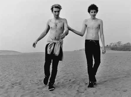 The boys grown up on a beach