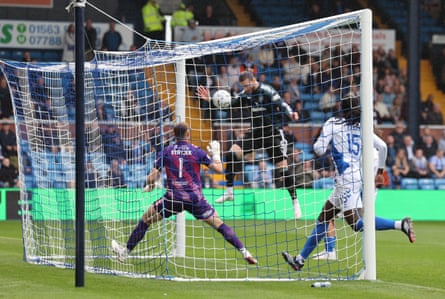 Celtic’s Kasper Høgh scores his side’s first goal against Kilmarnock with a header.