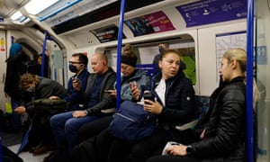 Commuters on the London Underground on 20 October.