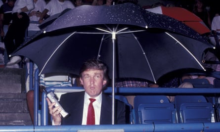 Donald Trump with his phone courtside at the 1989 US Open