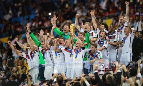 Philipp Lahm lifts the World Cup trophy after defeating Argentina 1-0 in the 2014 final in Rio de Janeiro, Brazil