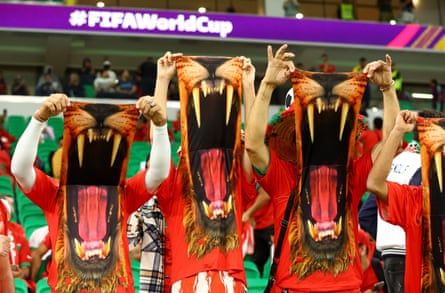 Morocco fans with lion masks at the 2022 World Cup quarter-final with Portugal