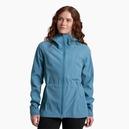 A model wearing a blue jacket