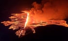 Iceland volcanic eruption: barriers reinforced as lava flows towards town