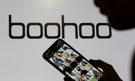Boohoo site on phone with logo in the background