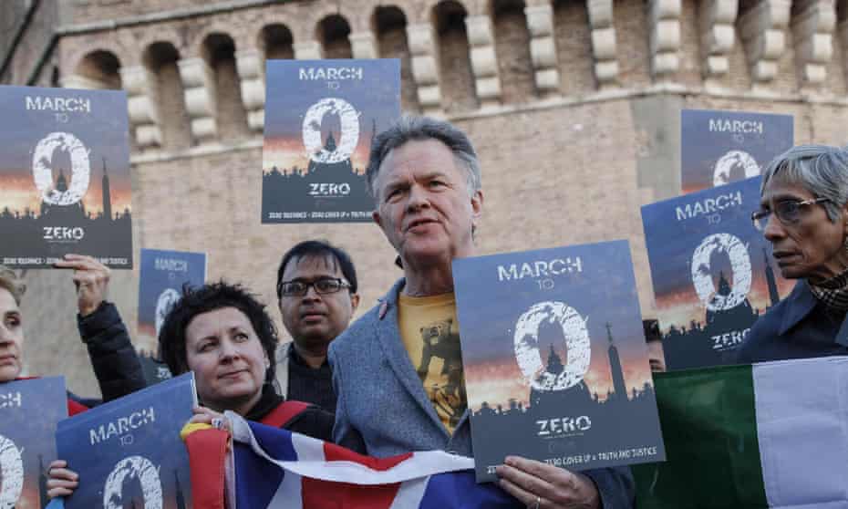 People gather during a twilight vigil prayer for the victims of sex abuse in Rome.