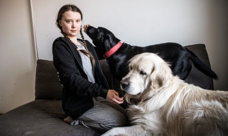 Greta Thunberg with her dogs at home in Stockholm.