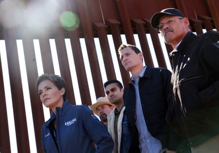 The prominent Arizona election deniers Kari Lake, left, and Mark Finchem, far right, stage a press conference at the US-Mexico border alongside fellow state Republican politicians David Gowan, Abe Hamadeh and Blake Masters in Sierra Vista in 2022.