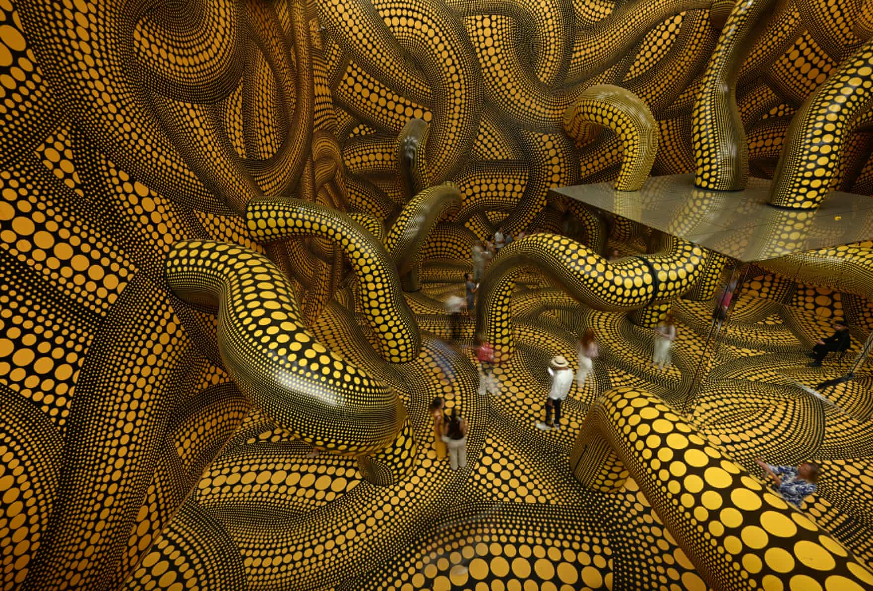 Kusama’s “Infinity Mirrored Room The Hope of the Polka Dots Buried in Infinity Will Eternally Cover the Universe” at the Museum Ludwig in Cologne, Germany, 2026.