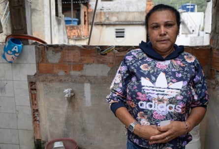Vera Julião da Silva standing on a veranda