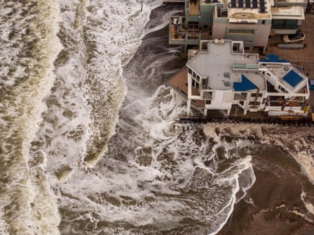 A view of waves crashing on to a shore.