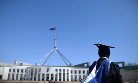 A university graduate is seen outside Parliament House in Canberra. Many international students who had long planned to study in Australia, are switching to Canada, the UK, the US and Ireland, where borders are largely open.