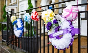 Wreaths are displayed outside a care home.