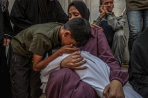a grieving woman and child