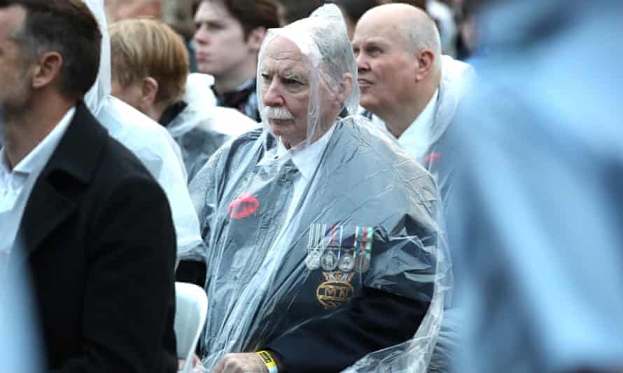 People attend the dawn service at Currumbin, during Anzac Day in Gold Coast, Monday, April 25, 2022. (AAP Image/Jono Searle)