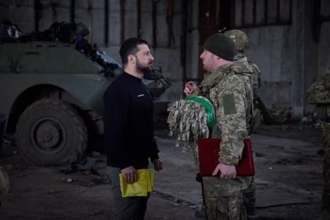 Zelenskiy talks to a Ukrainian soldier during his visit to Bakhmut frontline in Donetsk region.