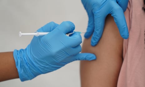 A person receives a Covid vaccine.