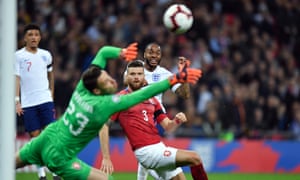 Raheem Sterling curls in his second and England’s third goal