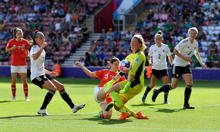 Northern Ireland goalkeeper Jacqueline Burns saves from Austria's Sarah Zadrazil.