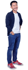 Nelson, in a shirt and jeans, stands smiling with one hand in his pocket