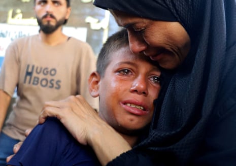 Funeral of Palestinians killed in Israeli fire while seeking aid on Wednesday in Gaza City.