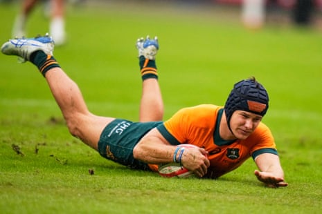 Australia’s Josh Flook scores a try