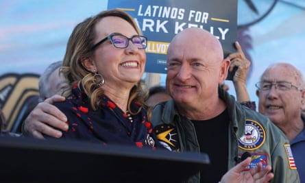 kelly with arm around giffords