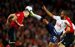 Tottenham’s Lucas Moura catches Phil Jones with a high boot.